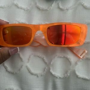 Orange Gucci sunglasses